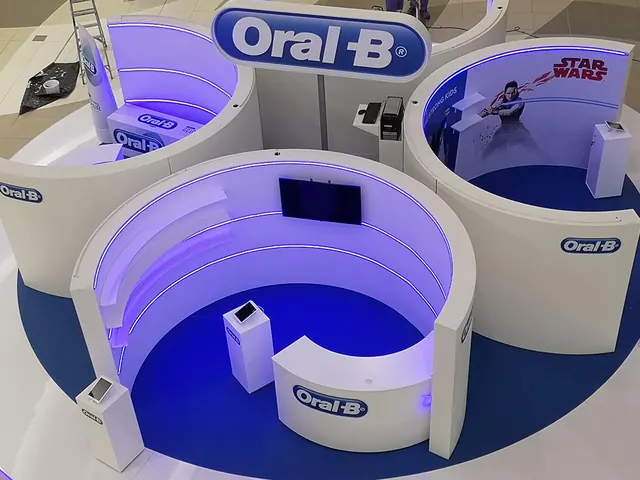 An Oral-B mall activation of curved white booths lit in blue, with Star Wars graphics